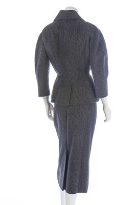 Lot 80 - A Jacques Fath couture grey wool suit, early...