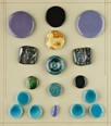 Lot 23 - Two display boards of ceramic buttons, circa...