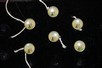 Lot 62 - A rare set of six golfing waistcoat buttons,...