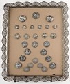 Lot 42 - Three display cards of mainly silver buttons,...