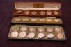 Lot 35 - Four sets of silver buttons, comprising:...