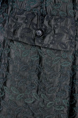 Lot 196 - A Jacques Fath embroidered black satin tent coat, 1954