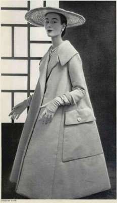 Lot 196 - A Jacques Fath embroidered black satin tent coat, 1954