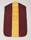 Lot 222 - A purple tufted velvet chasuble applied with...