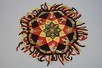 Lot 214 - An embroidered patchworked table cover, mid...