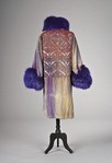 Lot 128 - A Worth embroidered and beaded velvet evening...