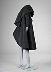 Lot 137 - A fine Balenciaga black silk faille tent coat,...