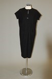 Lot 145 - A Balenciaga black bouclé wool day dress,...