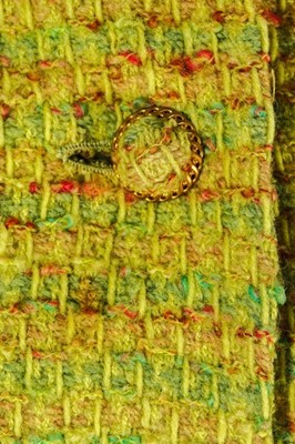 Lot 95 - A Chanel couture chartreuse tweed suit, 1968,...