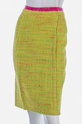 Lot 95 - A Chanel couture chartreuse tweed suit, 1968,...