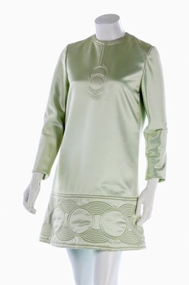 Lot 108 - A Pierre Cardin quilted aqua satin mini-dress,...