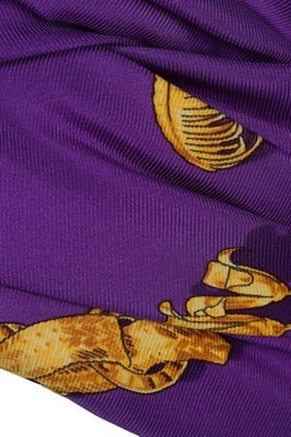 Lot 22 - An Hermès printed purple silk turban, probably...
