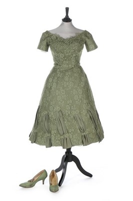 Lot 147 - A Ceil Chapman sage-green lace dress, 1959,...