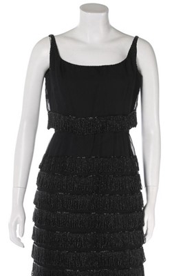 Lot 231 - A couture black beaded cigaline dress, circa...