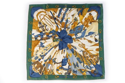 Lot 204 - Three Hermès silk scarves, comprising...