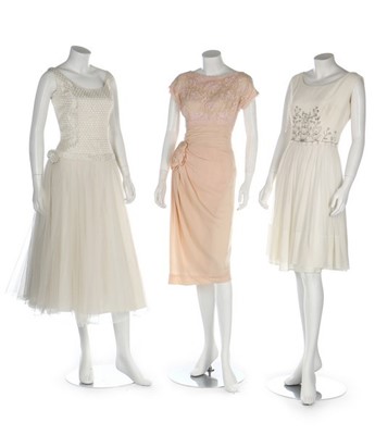 Lot 56 - Seven cocktail dresses in mainly ivory and...
