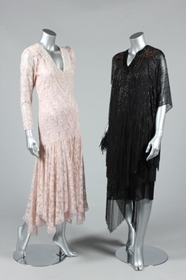 Lot 129 - A black beaded gauze 1920s style tunic,...