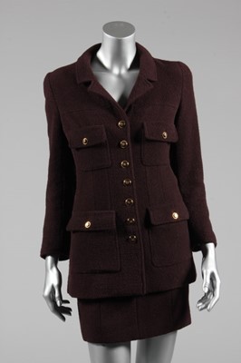 Lot 136 - A Chanel brown wool suit, boutique labelled...