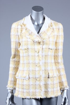 Lot 142 - A Chanel summery jacket, of yellow, white and...