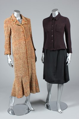 Lot 144 - A Chanel beige and orange coat, with wooden...