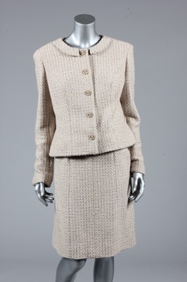 Lot 153 - A Chanel boutique silk/wool tweed suit,...