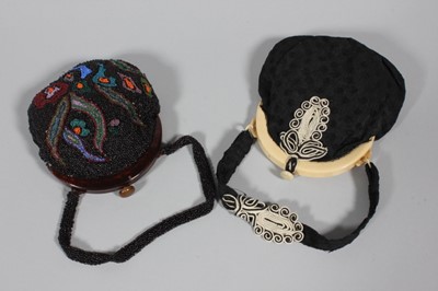 Lot 174 - Five evening bags, including a heavily beaded...