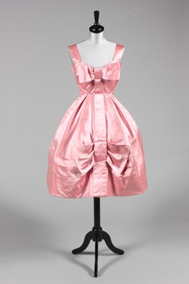 Lot 176 - A Rahvis couture pink satin cocktail dress,...