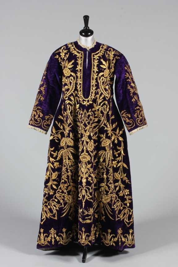 Lot 180 - An embroidered purple velvet wedding robe,