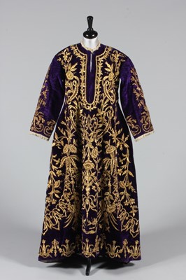 Lot 180 - An embroidered purple velvet wedding robe,...