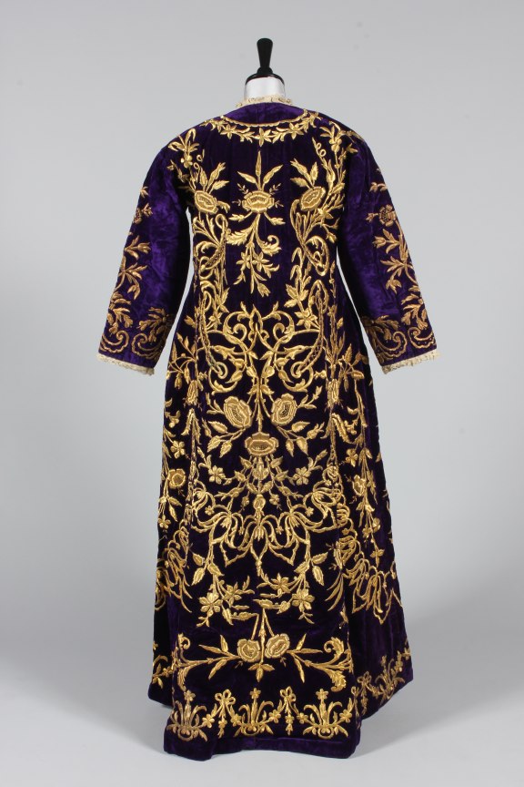 Lot 180 - An embroidered purple velvet wedding robe,