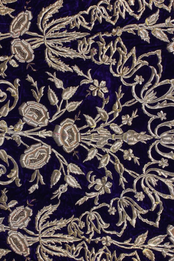 Lot 180 - An embroidered purple velvet wedding robe,