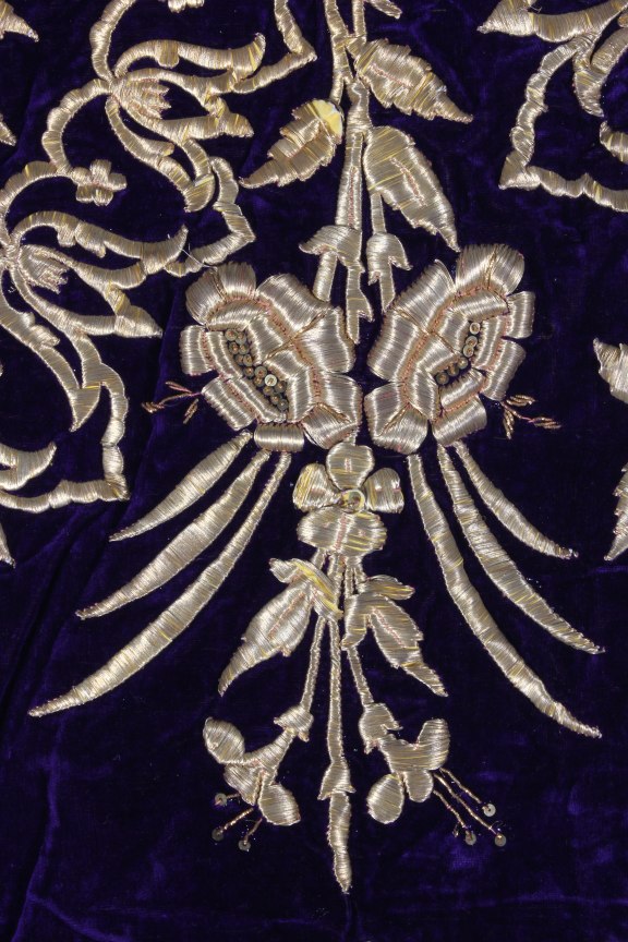 Lot 180 - An embroidered purple velvet wedding robe,