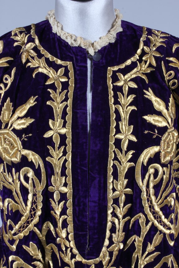 Lot 180 - An embroidered purple velvet wedding robe,