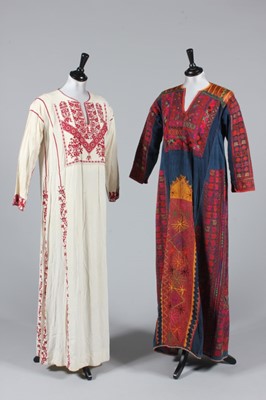 Lot 181 - Two embroidered Palestinian robes, 1960s, one...