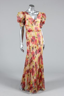 Lot 191 - A printed floral chiffon garden party dress,...