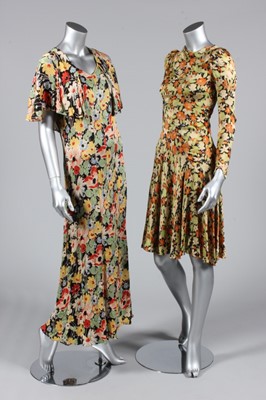 Lot 193 - Two printed satin evening gowns, mid-late...