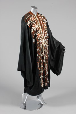 Lot 197 - An embroidered wedding robe, Egyptian, 1960s,...