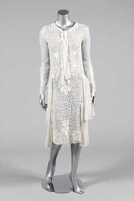 Lot 201 - A lace summer/bridal gown, circa 1923, of...