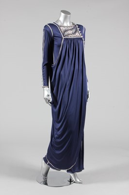 Lot 214 - A Bill Gibb blue Quiana jersey evening gown,...