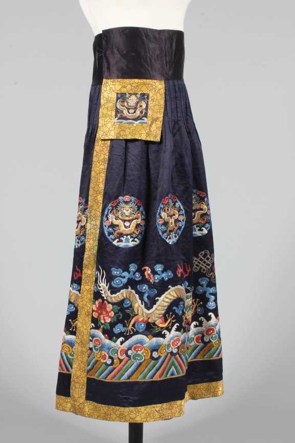 Lot 231 - An embroidered midnight blue satin chaofu...