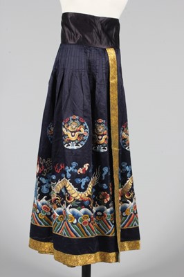 Lot 231 - An embroidered midnight blue satin chaofu...