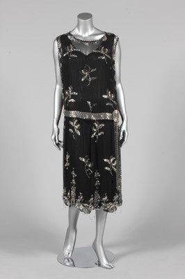 Lot 244 - A silver beaded black chiffon cocktail dress,...