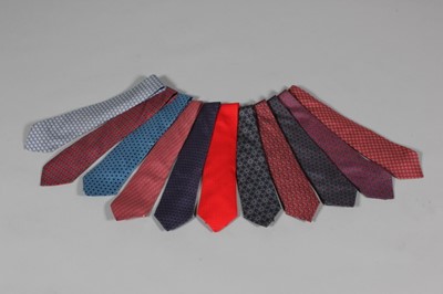 Lot 12 - Hermès printed silk ties, small-scale repeats,...