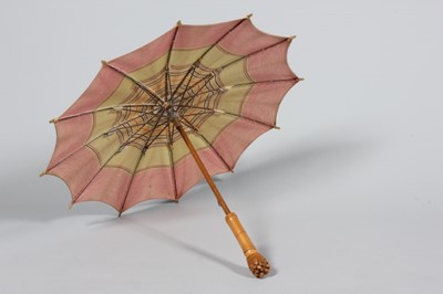 Lot 256 - A rare Hermès parasol, 1920s, labelled to the...