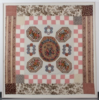 Lot 288 - A patchwork coverlet, the centre panel circa...