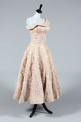 Lot 294 - A pale pink sequined evening gown, designed by...