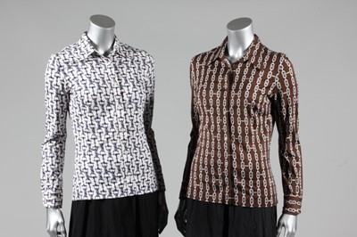 Lot 334 - A large group of Celine shirts, mainly 1970s,...