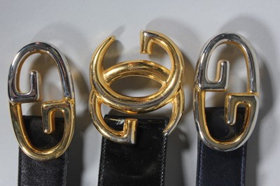 Lot 341 - Four Gucci leather belts, 1970-80s, with large...