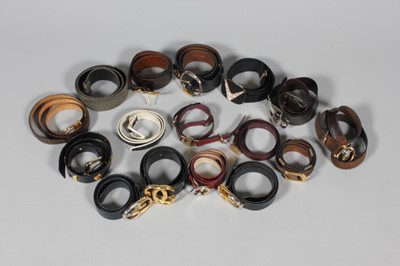 Lot 341 - Four Gucci leather belts, 1970-80s, with large...