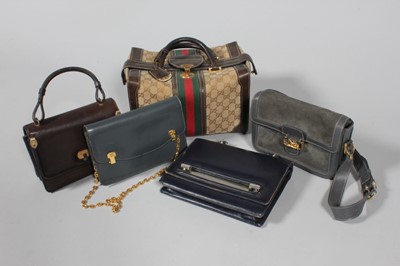 Lot 346 - A Gucci vanity case and four assorted handbags,...